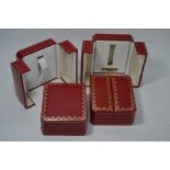 Four Cartier watch boxes