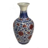 A Chinese underglaze blue and iron red porcelain vase, bears Yongzheng mark