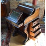 A Victorian mahogany piano top davenport desk