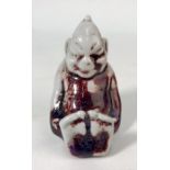 A Bernard Moore novelty miniature figure of a seated imp