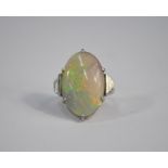 An oval opal ring in the Art Deco style