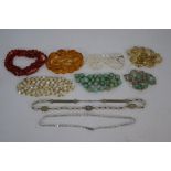 Nine various vintage glass and stone bead necklaces