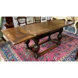 A 17th century Dutch oak draw-leaf dining table