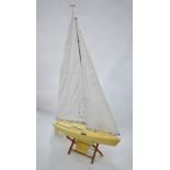 A Kyosho Fairwind plastic pond yacht