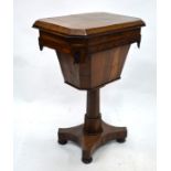 A Victorian rosewood work table with hinged top