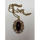 A 9ct yellow gold pendant in the Victorian manner