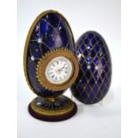 A Continental enamelled egg table-clock