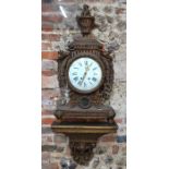 A large French carved (dull) giltwood bracket clock, 19th century