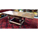 A 17th century and later oak draw-leaf dining table