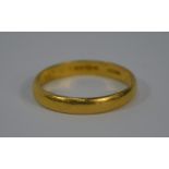 A 22ct yellow gold D-shaped wedding band