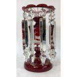 A 19th century Bohemian ruby flash cut glass table lustre