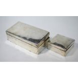 Two silver cigarette boxes