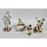 A Meissen figural table salt and three porcelain figures