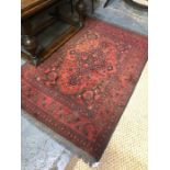 A contemporary turkish rug, red ground