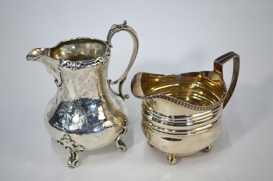 George III silver cream jug and another