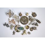 A collection of mainly white metal and silver jewellery items