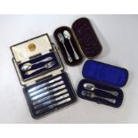 Cased set of silver tea-knives etc.