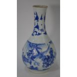 A Chinese transitional style blue and white bottle vase