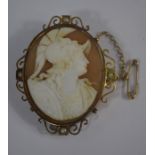 A Victorian oval shell cameo brooch featuring Mars