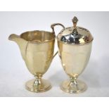 A Mappin & Webb cream jug and sugar caster