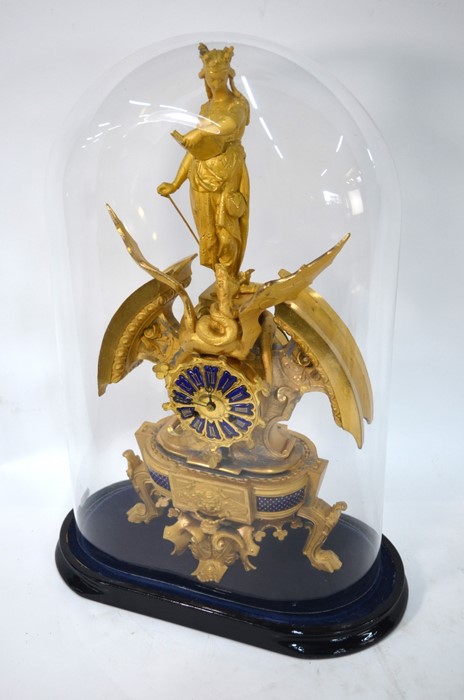 A French gilt mantel clock surmounted by an allegorical representation of St Margaret and the Dragon