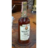 A 75cl bottle of Walkers' 8 Year Old Deluxe Bourbon, circa 1970's, a straight bourbon from Hiram