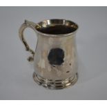 A George II silver baluster pint mug