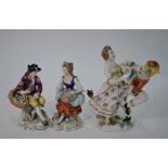 A Naples porcelain group and Sitzendorf pair of figures