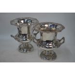 A pair of silver-plated large two-handled wine coolers