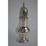 A George II silver baluster caster