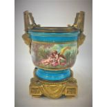 A good Sevres 'bleu celeste' ormolu mounted hand painted porcelain jardiniere, mid 19th century, att