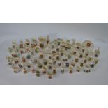 Sixty-four Goss crested china vessels etc.