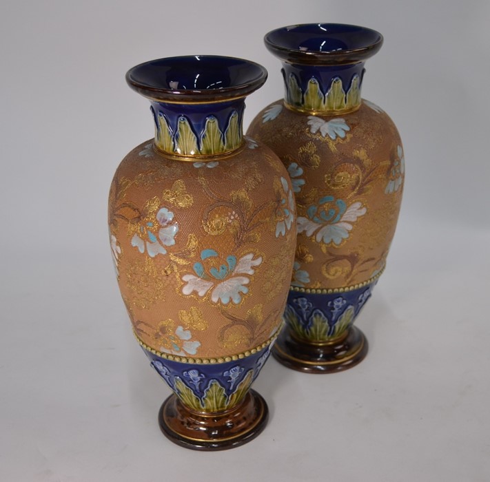 A pair of Doulton Lambeth stoneware vases