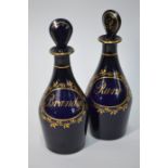 A pair of Bristol blue spirit decanters