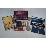 A cased set of six silver Masonic teaspoons