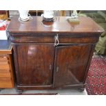 A 19th century mahogany cabinet with a cushion moulded drawer over a pair of cupboard doors,