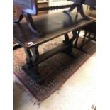 An old oak refectory table with centre stretcher