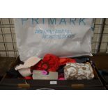Police recovered items - a large quantity of ladies mostly Primark clothing and a bag of make-up
