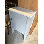 A vintage painted single door cupboard