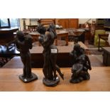 Three basalt effect erotic figure groups of couples