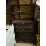 An Edwardian carved mahogany secretaire bookcase, the raised back with open shelves over a fall