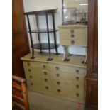 A limed oak chest of eight drawers to/w a matching three drawer side table (2)