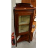 An Edwardian inlaid mahogany corner display cabinet