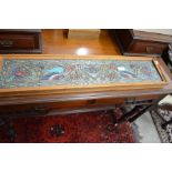 Framed Arts & Crafts style tube-lined tiles depicting a pair of birds - for wall mounting