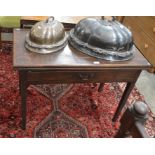 A Georgian mahogany tea table with folding top and frieze drawer raised on tapering square supports