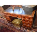 A Victorian mahogany twin pedestal desk, nine drawers with turned handles