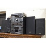 A Technics stacking music centre including amplifier, tuner, sound processor, CD player, cassette