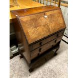 An old walnut bureau