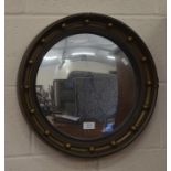A Regency style convex gilt framed wall mirror