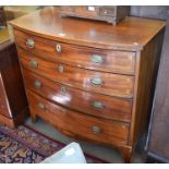 A 19th century mahogany crossbanded and inlaid bowfront chest of four long graduating drawers with